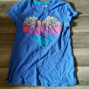 I'm selling a girls blue floral rainbow shirt.